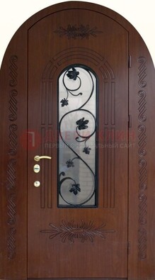 Качественная входная арочная дверь со стеклом и ковкой ДА-18 в Можайске