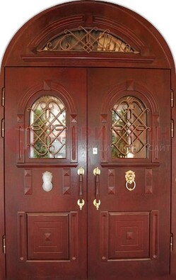 Стальная арочная дверь со стеклом и ковкой ДА-30 в дом из кирпича в Можайске