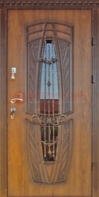 Дизайнерская железная дверь со стеклом и ковкой ДСК-182 в Можайске
