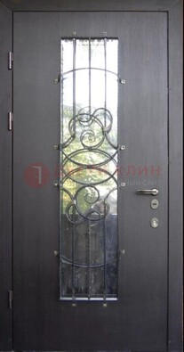 Остекленная стальная дверь с ковкой ДСК-26 в Екатеринбурге