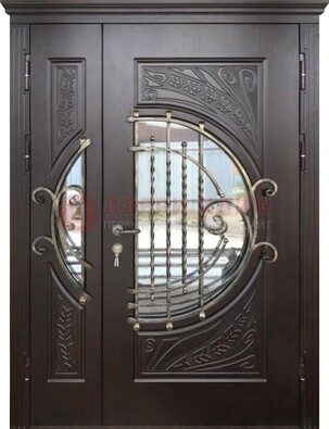 Темная стальная дверь Винорит стекло и ковка для коттеджа ДСК-273 в Бронницах