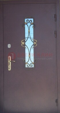 Металлическая дверь со стеклом и ковкой ДСК-77 в панельный дом в Сергиевом Посаде