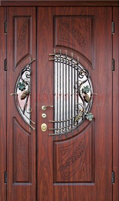 Железная дверь с виноритом и стеклом с ковкой ДВТ-170 в Можайске