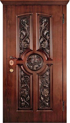 Филенчатая металлическая дверь с виноритом и резьбой ДВТ-69 в Можайске